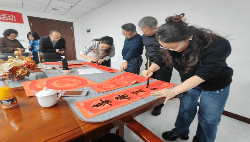 民进山西直属基层组织联合开展“春联万家·策马启新”公益活动(图2)